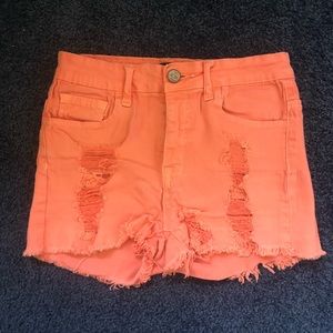 Orange stretchy high waisted jean shorts
